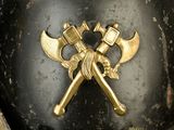 a helmet that has two crossed axes on it