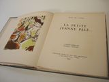 an open book with a picture of a woman on it