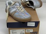 baby boy ' s shoes in a box on a white surface