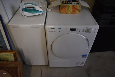a white washer and a dryer sitting next to each other