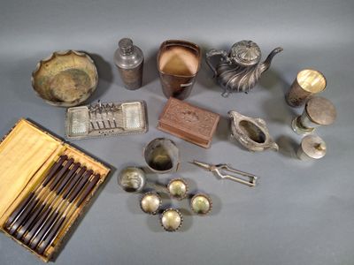 a lot of silver items that are on the table