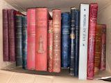 a box full of books that are sitting on a table