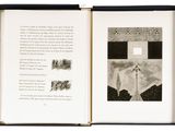 an open book with a picture of a cross on it