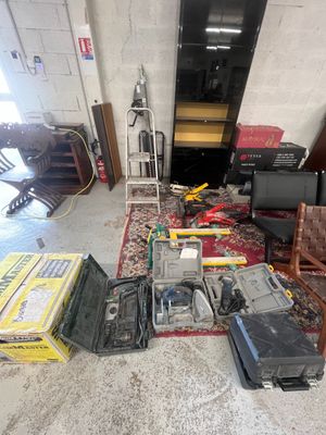 a lot of electronics that are sitting on the floor