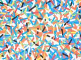 colorful confetti sprinkles on a white background