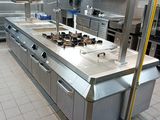 a large kitchen with a lot of counter space in it