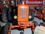 a tractor that is parked in a garage