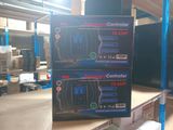 two boxes that are sitting on a shelf in a room