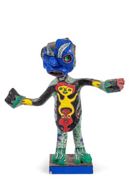 figurine of a man with a painted body and arms