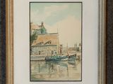 aquarelle encadrée représentant un bateau dans un port, avec un bâtiment en arrière-plan