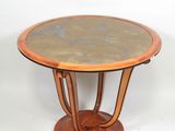 an image of a table with a marble top and wooden legs