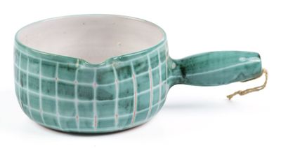a green cup with a handle on a white background