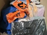 a box full of clothes and other items that are in it