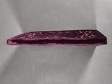 an image of a purple velvet box with a gold design on it