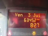 a digital display on the dashboard of a car