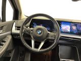 the interior of a car with a steering wheel and dashboard