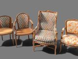 three chairs with upholstered back cushions and a patterned upholstered back