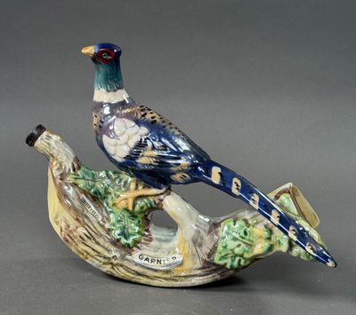 a bird that is sitting on a branch of a tree