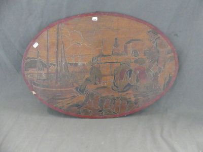 une plaque en bois sur laquelle est dessinée la silhouette d'un homme à cheval