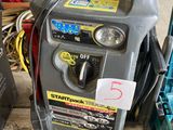 an image of a car washer in a garage