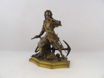 statue en bronze représentant un homme muni d'une épée et accompagné d'un chien, posée sur un socle
