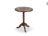 a wooden table with a round top and a wooden base