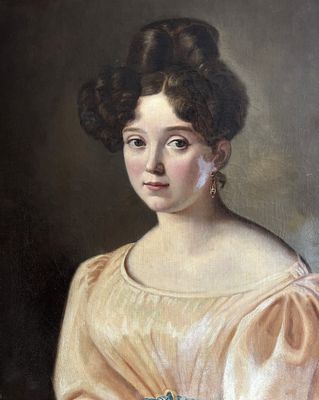 portrait of a woman in a pink dress holding a basket of flowers