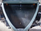 a motorcycle with an open trunk on the back of it