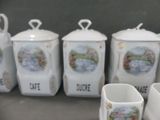 five cups that are sitting next to each other on a table