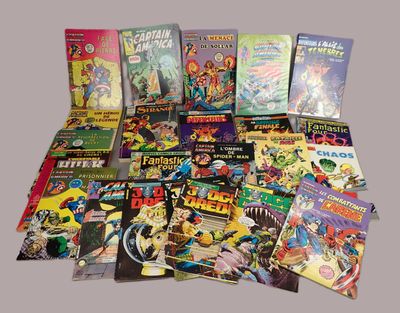 a lot of comic books that are on the table