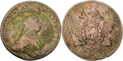 a close up of a coin with a crown on it