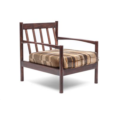 an image of a wooden chair with a plaid cushion on it