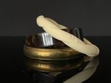 two rings that are sitting on top of a table