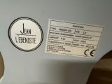 a label on the side of a sewing machine
