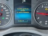 a car dashboard with a digital display on it