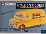 a box with a picture of a yellow van on it