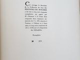 an open book with a black and white picture of a cat
