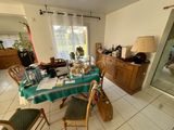 a dining room with a table and chairs in it