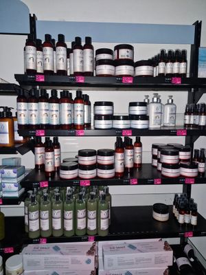 many different types of skin care products on the shelves