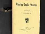 an old book with a picture of a man on it