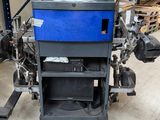 l'image d'une machine installée dans un entrepôt