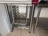 a stainless steel oven with a tray of food inside of it