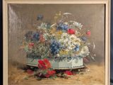 une peinture à l'huile représentant un vase de fleurs sur une table