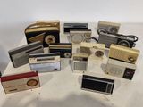many different types of radio on the table