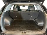 a trunk of a car with the doors open