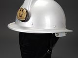 a white hard hat on a mannequin head