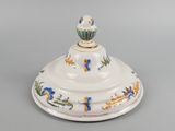 an image of a white bowl with blue and yellow designs on it