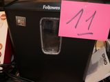 a picture of a radio with a pink note on it