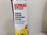 a close up of a can of sonax power ris with a red cap