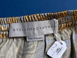 the label on the bottom of the pants shows the name of the item
